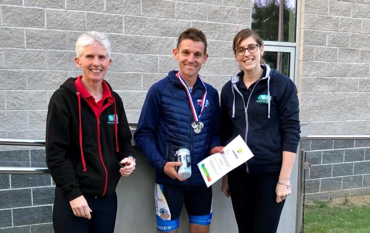 Pictured is Edward Clements, 1st overall male, with Jayne Richards (Go-Tri Co-ordinator) and Lisa Starkey.